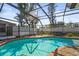 Inviting screened-in pool with brick patio at 7507 3Rd Nw Ave, Bradenton, FL 34209