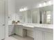 Modern bathroom with double vanity and ample counter space at 9048 Bernini Pl, Sarasota, FL 34240
