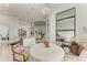 Breakfast nook with a round table and lake view at 9048 Bernini Pl, Sarasota, FL 34240