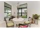 Bright breakfast nook with lake views at 9048 Bernini Pl, Sarasota, FL 34240