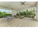 Relaxing community patio with seating and tables, perfect for outdoor gatherings at 9048 Bernini Pl, Sarasota, FL 34240