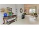 Elegant entryway with a console table and decorative accents at 9048 Bernini Pl, Sarasota, FL 34240
