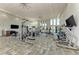 Bright and spacious fitness center with various equipment at 9048 Bernini Pl, Sarasota, FL 34240