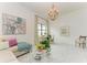 Bright and airy Gathering room with a comfortable seating area at 9048 Bernini Pl, Sarasota, FL 34240