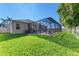 Large backyard with screened-in pool and spa at 11306 77Th E St, Parrish, FL 34219