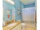 Light and bright bathroom with updated vanity and shower at 11306 77Th E St, Parrish, FL 34219