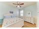 Spacious bedroom with starfish bedding and white dresser at 11306 77Th E St, Parrish, FL 34219