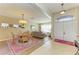 Dining room with chandelier and view to living room at 11306 77Th E St, Parrish, FL 34219