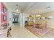 Dining area with ornate chairs and pink rug at 11306 77Th E St, Parrish, FL 34219