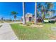Two-story house with three-car garage and palm trees at 11306 77Th E St, Parrish, FL 34219