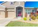 Red front door screened porch and landscaping at 11306 77Th E St, Parrish, FL 34219