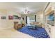Living room with comfortable seating and access to backyard pool at 11306 77Th E St, Parrish, FL 34219