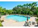 Refreshing community pool surrounded by lush landscaping at 11343 Walden Loop, Parrish, FL 34219