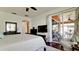 Main bedroom with king bed and access to private balcony at 1141 Riverscape St # C, Bradenton, FL 34208