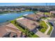 Community overview showcasing houses near a lake at 11467 Conch Ct, Venice, FL 34292