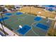 Community basketball court with two hoops and ample space at 11467 Conch Ct, Venice, FL 34292