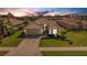Attractive single-story home with brick paver driveway and landscaped lawn at 11467 Conch Ct, Venice, FL 34292