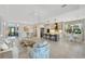 Open-concept kitchen and living space with modern appliances and island at 11467 Conch Ct, Venice, FL 34292