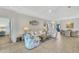 Spacious living area featuring comfortable seating and a coastal decor at 11467 Conch Ct, Venice, FL 34292