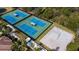 Community tennis and volleyball courts at 11467 Conch Ct, Venice, FL 34292