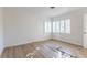 Well-lit bedroom featuring new flooring and large windows at 116 23Rd W St, Bradenton, FL 34205