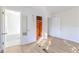 Simple bedroom with hardwood floors and a small closet at 116 23Rd W St, Bradenton, FL 34205