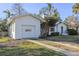 White single car garage with driveway at 116 23Rd W St, Bradenton, FL 34205