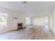 Living room with hardwood floors and fireplace at 116 23Rd W St, Bradenton, FL 34205