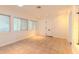 Sunroom with tile floors and bright windows at 116 23Rd W St, Bradenton, FL 34205