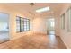 Sunroom with tile floor, skylight, and window views at 116 23Rd W St, Bradenton, FL 34205