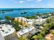 Aerial view of waterfront community with lush landscaping and boat slips at 14041 Bellagio Way # 315, Osprey, FL 34229