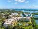 Waterfront condo building with pool and boat slips at 14041 Bellagio Way # 315, Osprey, FL 34229