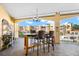 Outdoor balcony dining area with water views at 14041 Bellagio Way # 315, Osprey, FL 34229