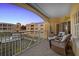 Relaxing balcony overlooking marina; wicker chairs & sunset view at 14041 Bellagio Way # 315, Osprey, FL 34229