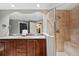 Bathroom with a double vanity and walk-in shower at 14041 Bellagio Way # 315, Osprey, FL 34229