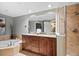 Bathroom boasts a walk-in shower and a large vanity at 14041 Bellagio Way # 315, Osprey, FL 34229