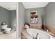 Spa-like bathroom with soaking tub, toilet and shower at 14041 Bellagio Way # 315, Osprey, FL 34229