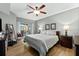Spacious bedroom with king-size bed and balcony access at 14041 Bellagio Way # 315, Osprey, FL 34229