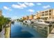Luxury condos with private boat docks and scenic canal views at 14041 Bellagio Way # 315, Osprey, FL 34229