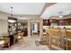 Open dining room with breakfast bar and kitchen view at 14041 Bellagio Way # 315, Osprey, FL 34229
