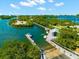 Community boardwalk and boat dock with calm waters at 14041 Bellagio Way # 315, Osprey, FL 34229