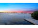 Tranquil waterfront view from private dock at sunset at 14041 Bellagio Way # 315, Osprey, FL 34229