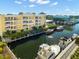 Condo building showcasing a unit with a balcony at 14041 Bellagio Way # 315, Osprey, FL 34229