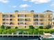Condo building with balconies overlooking the water at 14041 Bellagio Way # 315, Osprey, FL 34229