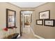 Hallway with artwork and access to bedrooms at 14041 Bellagio Way # 315, Osprey, FL 34229