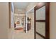Bright hallway with tile floors and access to other rooms at 14041 Bellagio Way # 315, Osprey, FL 34229