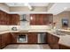 Modern kitchen with stainless steel appliances and ample counter space at 14041 Bellagio Way # 315, Osprey, FL 34229