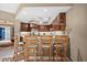 Kitchen boasts a breakfast bar and stainless steel appliances at 14041 Bellagio Way # 315, Osprey, FL 34229