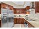 Modern kitchen with stainless steel appliances and granite counters at 14041 Bellagio Way # 315, Osprey, FL 34229