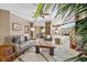 Spacious living room with comfy seating and large windows at 14041 Bellagio Way # 315, Osprey, FL 34229